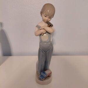Lladro Boy Figurine with Toy Car